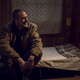 Negan (Jeffrey Dean Morgan) enjoys his favorite soap opera, a.k.a. Rosita, Gabriel, Siddiq, and Eugene.